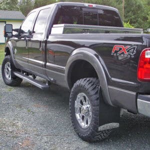 Mud Flaps on 2014 Ford F-350 SRW with flares, Black Powder Coated Lifted Truck Bracket on front and style#9 on rear, 14" wide drilling required for Trucks with Lift and Oversized Tires